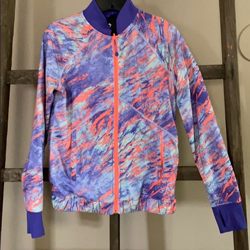 Girls reversible lightweight athletic jacket.